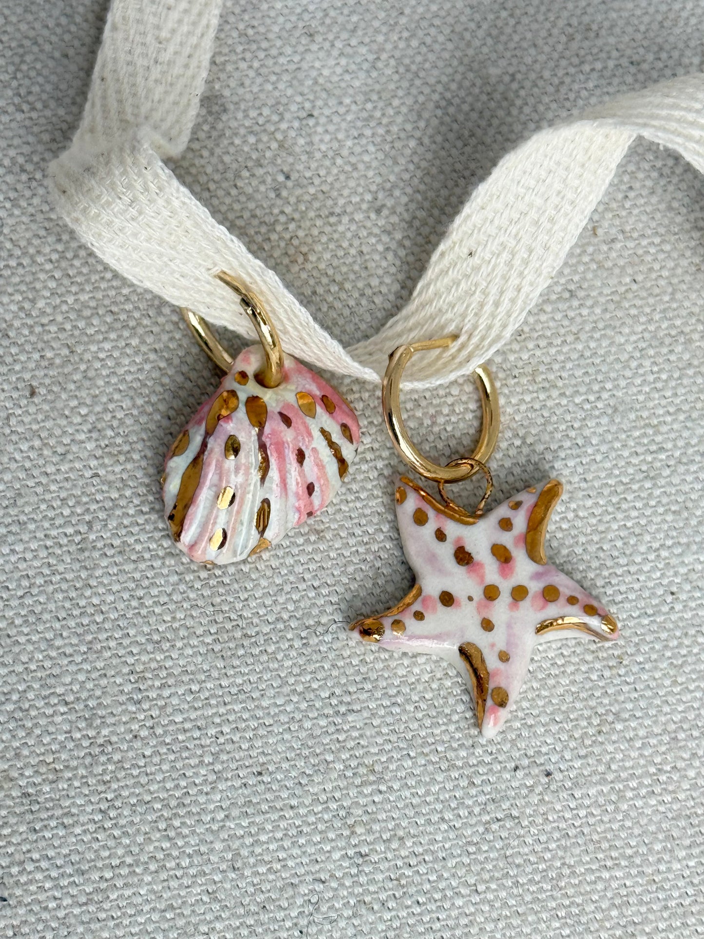 Mismatched Shell And starfish earrings pink
