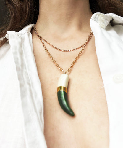 Shark tooth green on chest copy.jpg