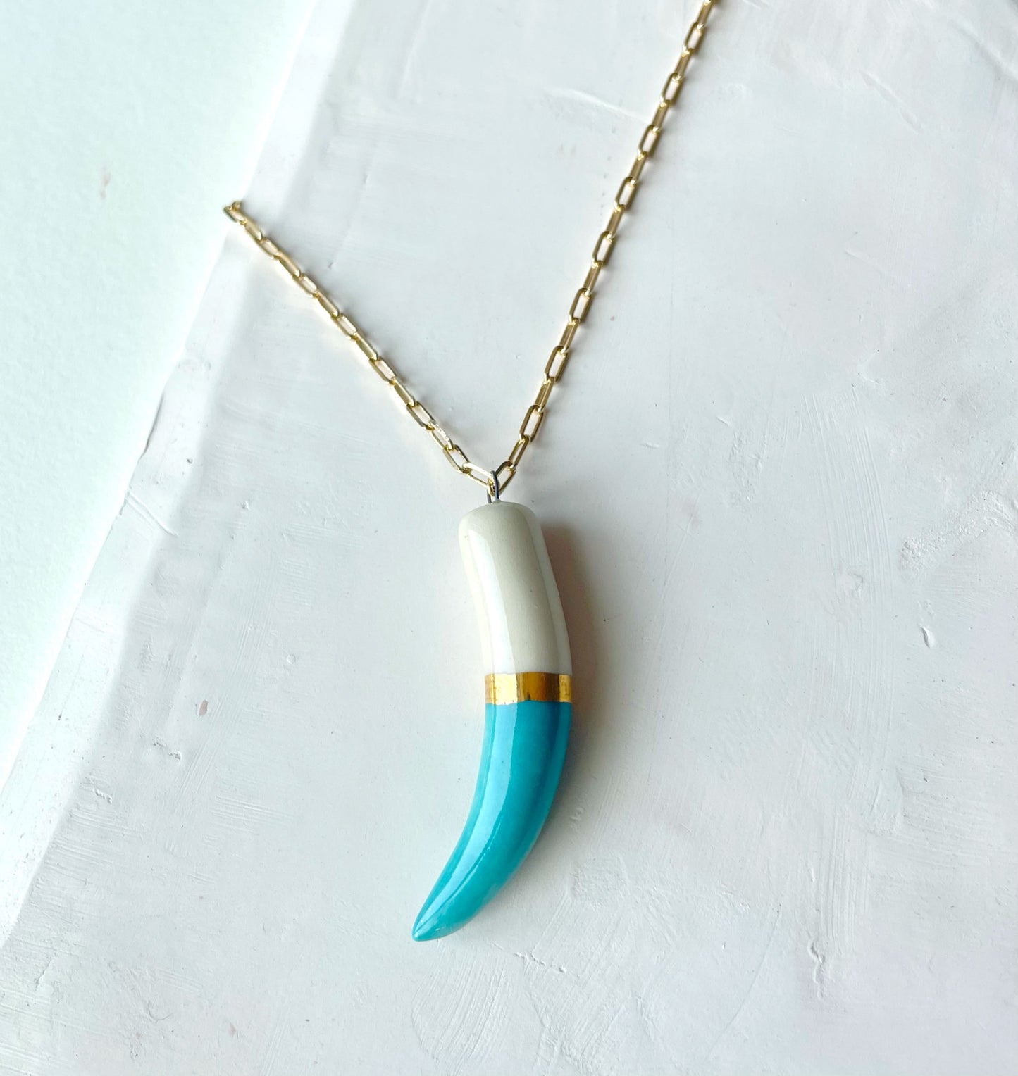 Shark-tooth-turquoise-on-stone_edited.jpg